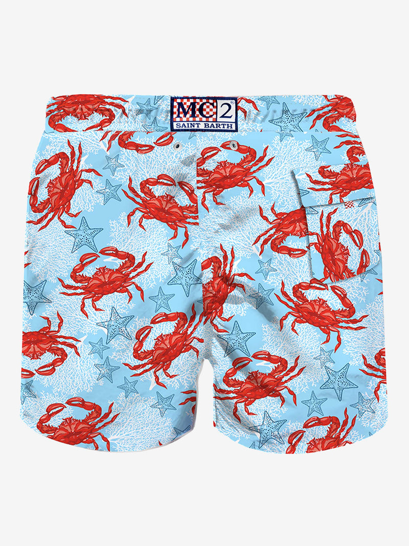 Light blue mid-length swim shorts with crab print